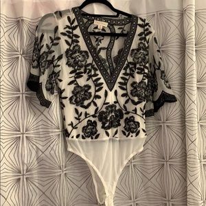 Black and cream bodysuit